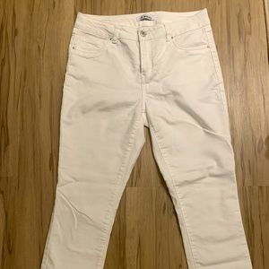 White jeans with frayed hem
